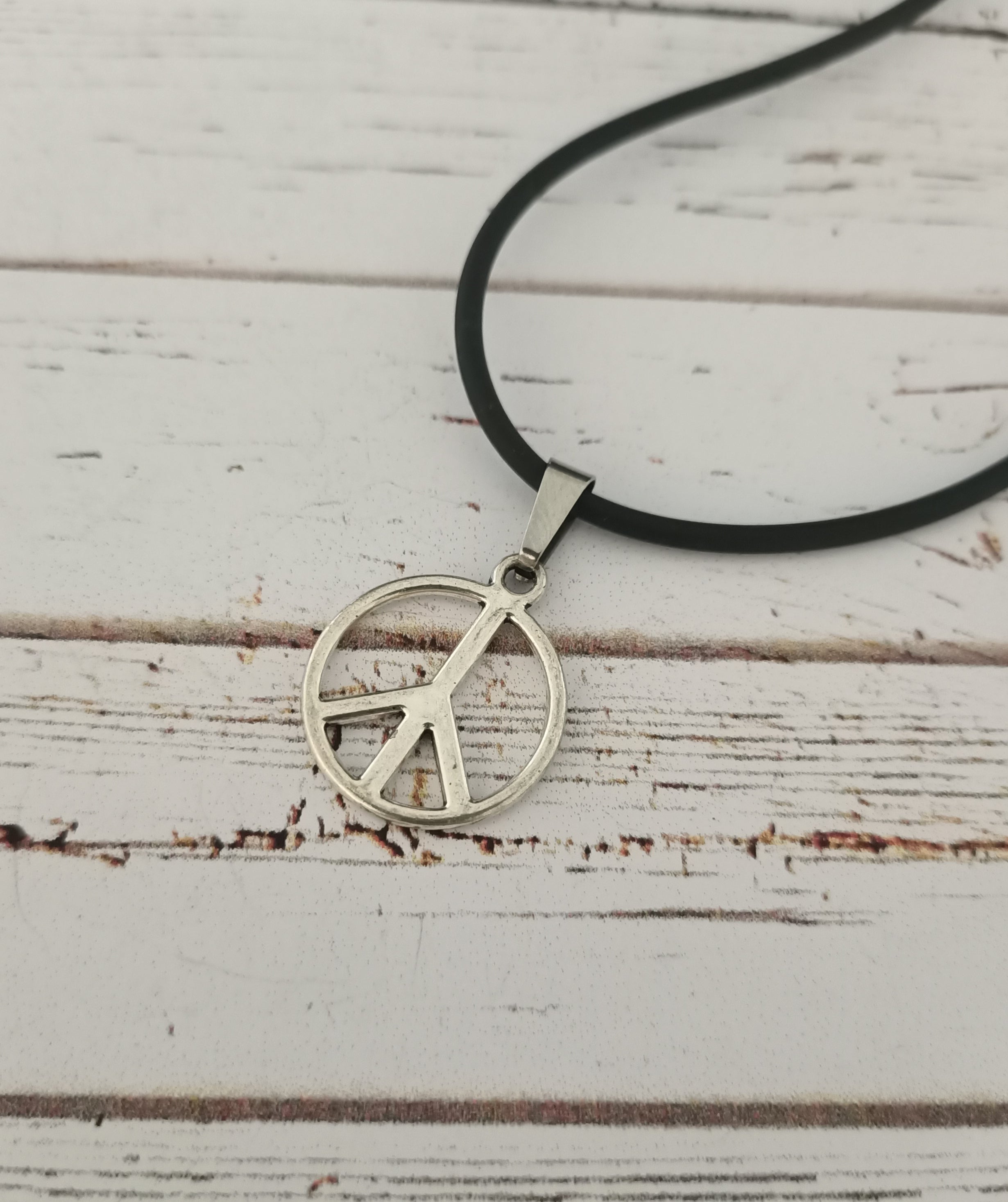 Piece sign necklace